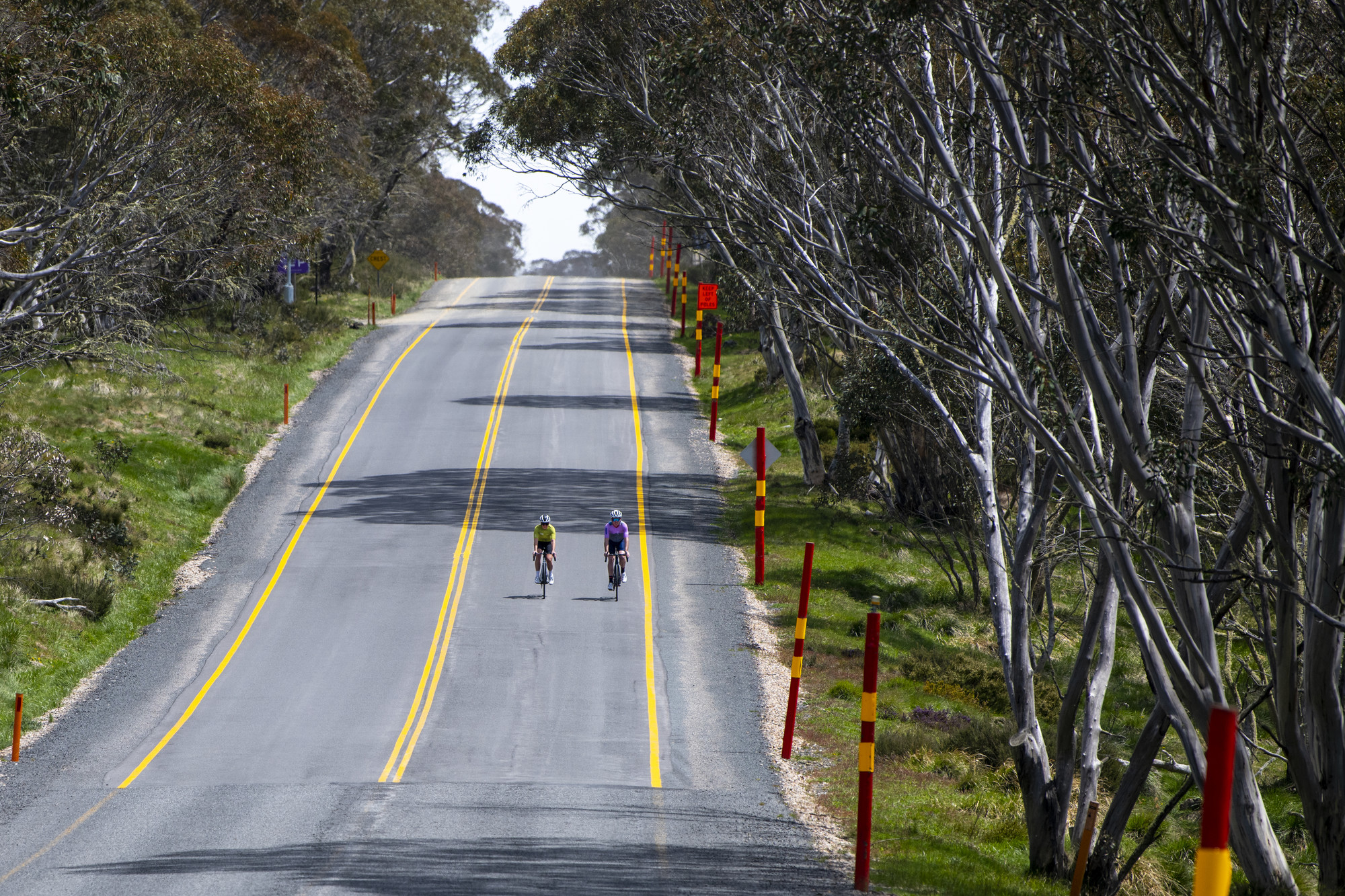 Two cyclists riding the 7 Peaks Challenge Dinner Plain road ride