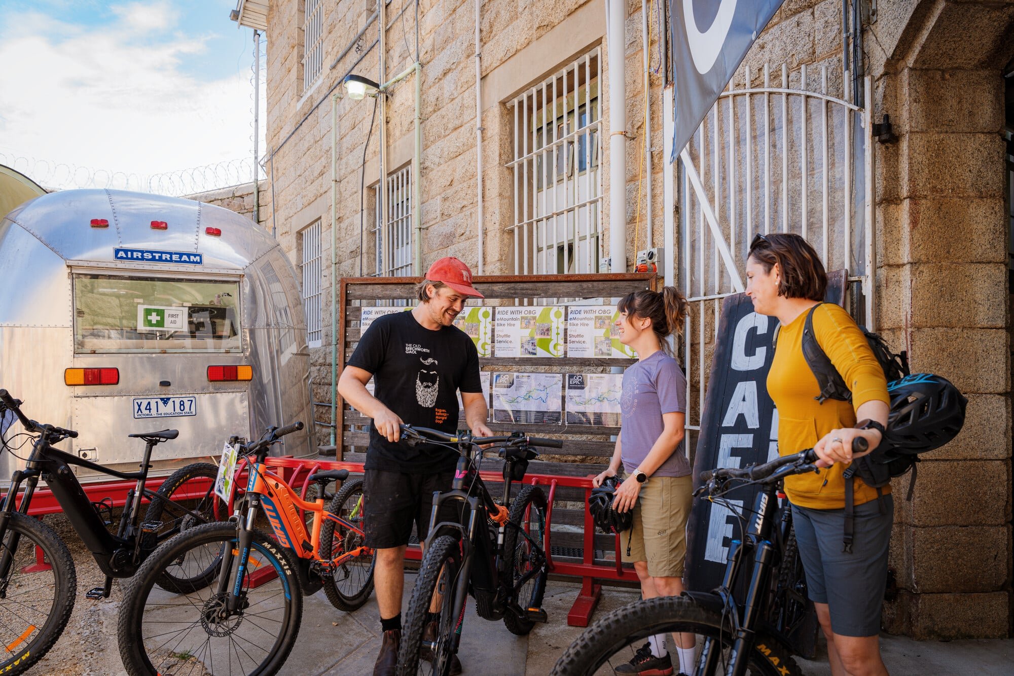 Cyclists renting bikes to ride the Indigo Epic at the Old Beechworth Gaol